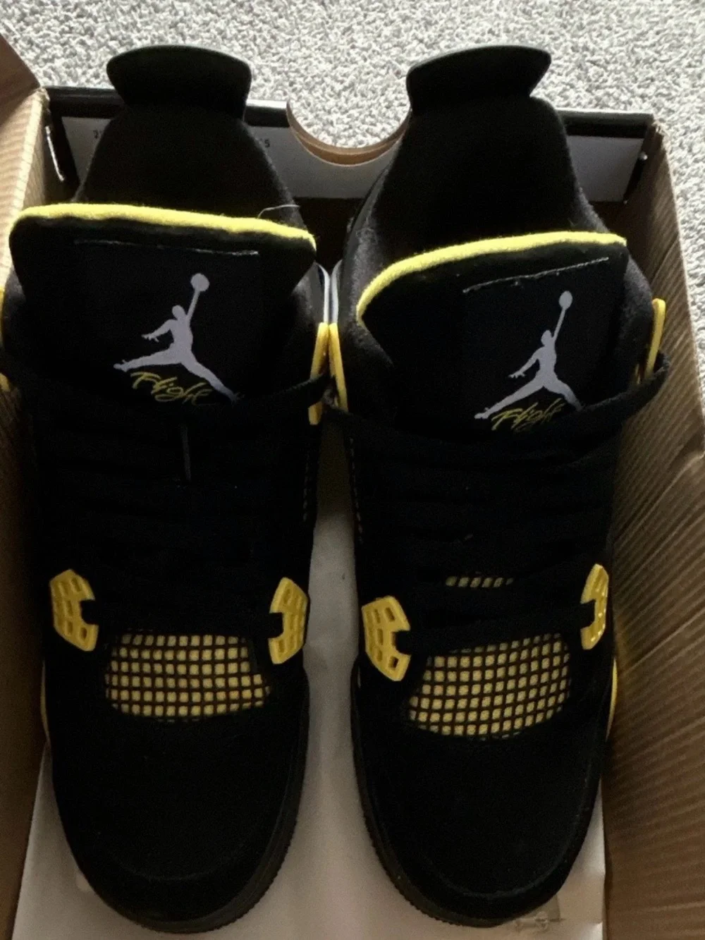 Jordan Retro 4 Black and Yellow Sneakers